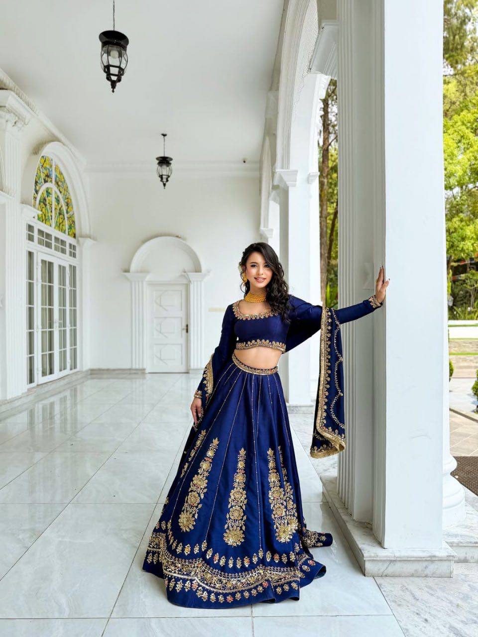 Radiant Rani Pink Silk Lehenga Choli Adorned with Opulent Heritage Floral Motifs and Intricate Zari Borders